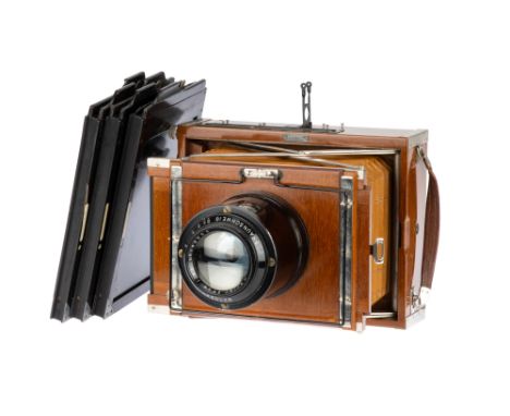 A Contessa Nettel Deckrullo-Nettel Tropen 13x18cm, 1919-26, teak, with Voigtlander Heliar f/4.5 240mm lens, black, serial no.