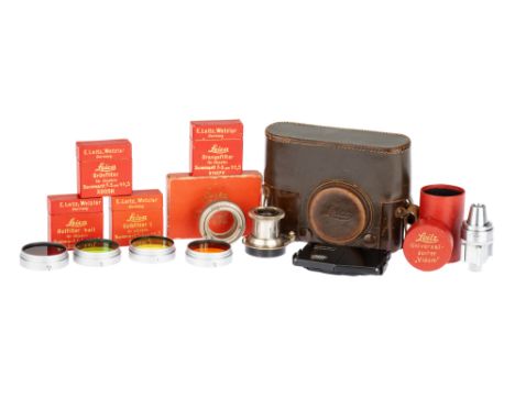 A Selection of Leitz Leica Camera Accessories, to include a Leitz Elmar f/3.5 5cm, serial no. 230708, nickel, body G, optics 