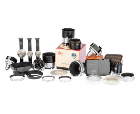 A Selection of Leitz Leica Camera Accessories, to include a Leitz Canada Elmar f/3.5 65mm lens head, in maker's box, two FODI