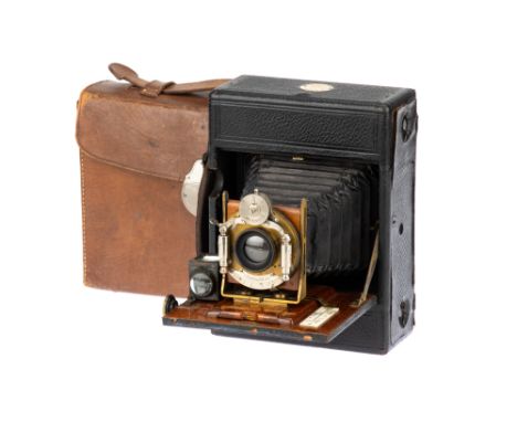 A J. Lizars Challenge Model D Roll Film Folding Camera, 1905, mahogany, with Taylor &amp; Hobson 5.05" lens, body G, some lig