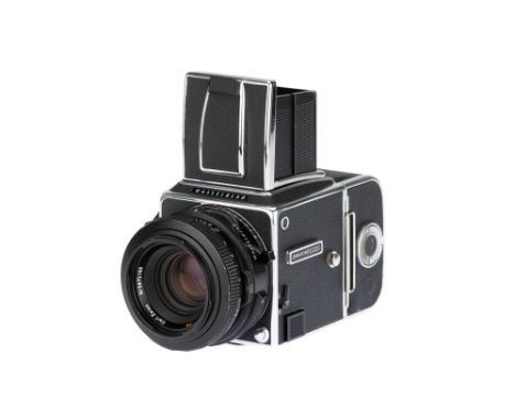 A Hasselblad 2000FC/M Medium Format Camera, 1984, chrome, serial no. RI1519654, with Carl Zeiss Planar T* f/2.8 80mm lens, bl