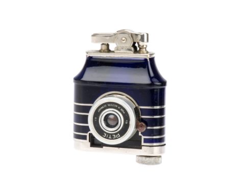 A Kunik Walter Petie Lighter Camera, 1956, lacquered-blue, with f/11 25mm lens, body, G-VG, shutter working, lens, VG