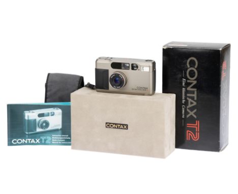 A Contax T2 Compact Camera, 1990, titanium, serial no. 046869, with Carl Zeiss Sonnar T* f/2.8 38mm lens, body, E, shutter wo