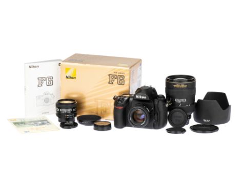 A Nikon F6 35mm SLR Camera Outfit, 2004-2020, black, serial no. 0032513, with a Nikon AF Nikkor f/2.8 28mm D lens, serial no.