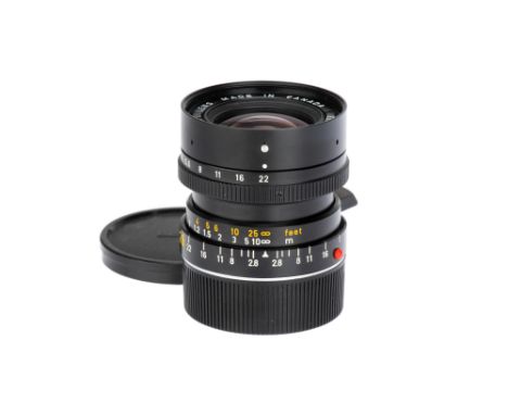 A Leitz Elmarit-M f/2.8 28mm Lens, 1979, 3rd version, black, serial no. 2978178, body, VG, elements, VG, some light internal 