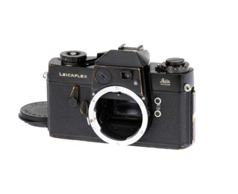 A Leitz Leicaflex 35mm SLR Camera Body, 1964, black paint, serial no. 1084140, with pie-style frame counter, body G-VG, shutt