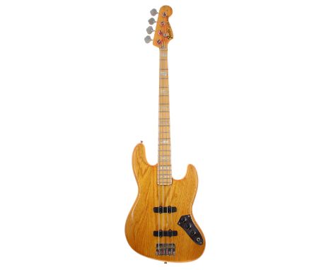 1975 Fender Jazz Bass guitar, made in USA, ser. no. 6xxxx6; Finish: natural, stripped and lacquered with original pickguard h