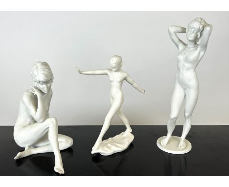 KAISER PARIAN WARE FIGURES, two, together with a Goebel blanc de chine figure, largest 33cm. (3) 