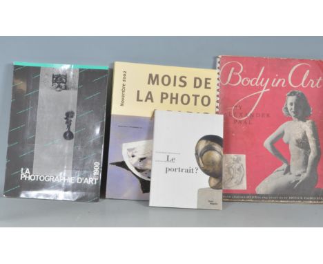 A collection of four art photography books and novels erotic books to include Body in Art - Alexander Pall, Mois De La Photo 