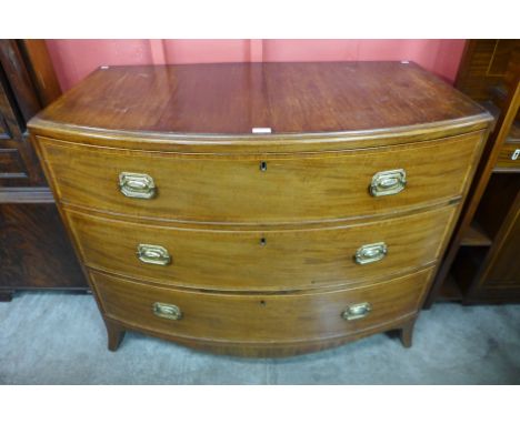 A George III inlaid mahogany bow front chest of drawers 