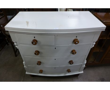 A Victorian painted bow front chest of drawers 