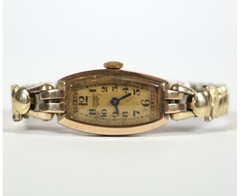 DAU, Herst Rolex, C. Bucherer, 1930er Jahre,Art Deco Epoche, 9K- Goldgehäuse, hochovales Zifferblatt, goldfarben (berieben), 