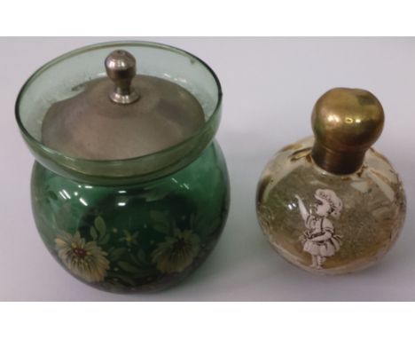 A LADY GREGORY YELLOW GLASS SCENT BOTTLE WITH TYPICAL WHITE ENAMEL DECORATION, ALONG WITH A GREEN PAINTED JAR MONOGRAMMED E.B