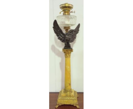 A FINE ANTIQUE SIENNA MARBLE AND BRONZED, WINGED EAGLE, VICTORIAN OIL LAMP WITH CUT GLASS PARAFFIN RECEPTACLE. HEIGHT 24ins A