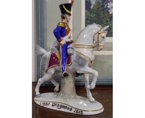 A MEISSEN FIGURE OF A LIGHT DRAGOON, MOUNTED.