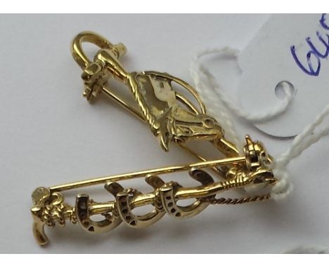 TWO SILVER GILT HUNTING BROOCHES 