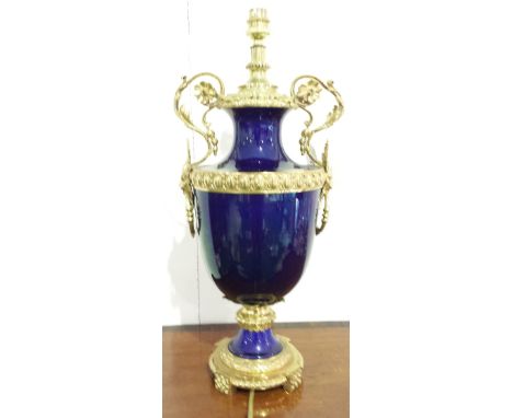 A COBALT BLUE AND ORMOLU MOUNTED TABLE LAMP, NOW ELECTRIFIED. HEIGHT 14ins APPROXIMATELY.