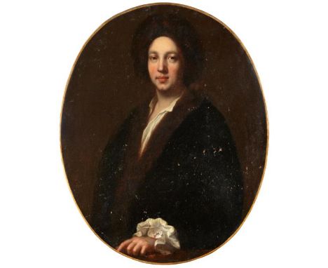 Circle of Jonathan Richardson (b.c.1665-1745) Portrait of a young gentleman, half-length, wearing a fur hat with white chemis