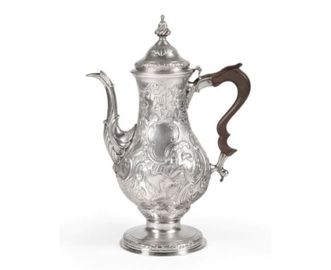 A George III Irish Silver Coffee Pot, mark of Carden Terry, Cork, overstriking another, circa 1775, of baluster form on pedes