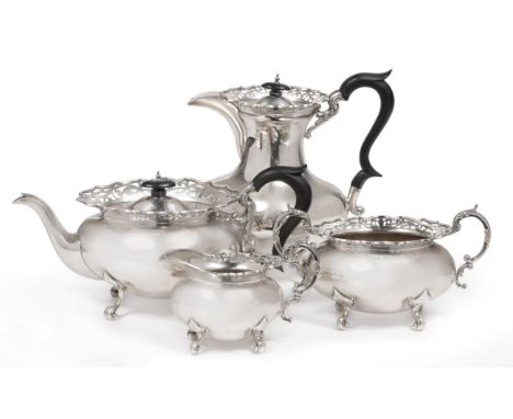 A George V Silver Four Piece Tea Service, James Deakin & Sons, Sheffield 1917, of shaped oval bellied form with pierced galle