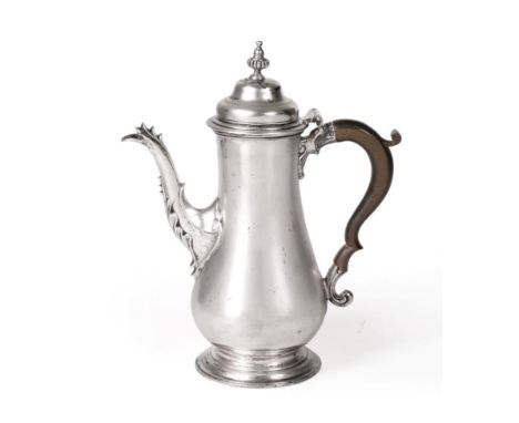 An Early George III Silver Coffee Pot, maker's mark rubbed, possibly W & J Priest or W & R Peaston, London 1764, of plain bal