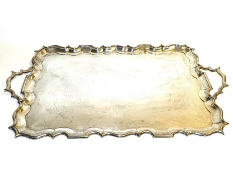 A Large Late Victorian Silver Twin-Handled Tray, Goldsmiths & Silversmiths Co (Gibson & Langman), London 1897, rectangular wi