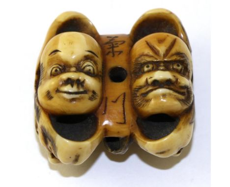 A Japanese Ivory Netsuke, Meiji period, as a group of Noh masks, signed, 4.5cm; and A Small Okimono, as Oni tormenting a recu