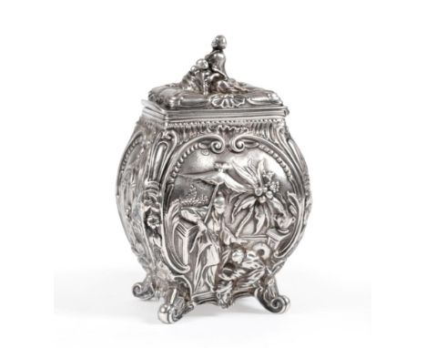 A George II Chinoiserie Silver Tea Caddy, Emick Romer, London 1759, of rectangular bombe shape, the hinged cover with figural