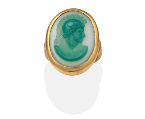 A 22 Carat Gold Carved Agate Cameo Ring, an oval green agate carved in relief with the bust of a classical soldier, in a yell