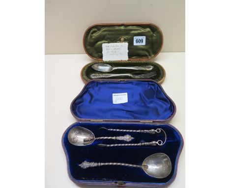 A silver two piece christening set comprising fork and spoon, indistinctly hallmarked, and one further three piece set, both 