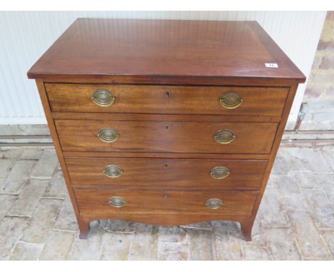 A mahogany 4 drawer chest on splayed bracket feet, 72cm tall x 69cm x 50cm 