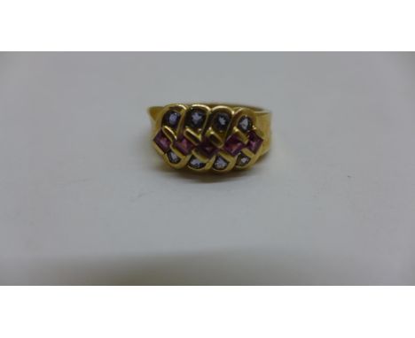 A 9ct gold ruby and tanzanite ring, size Q, approx 5gs, hallmarked, generally good condition