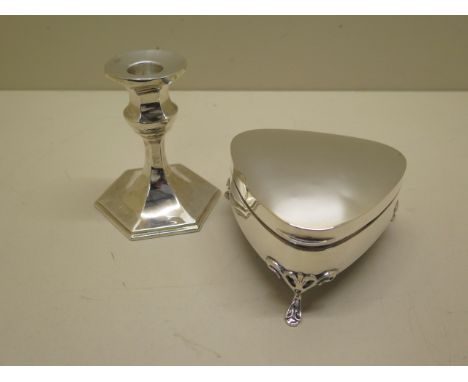 A weighted silver trinket box and a silver candlestick, some general wear to both, total weight approx 10.5 troy oz 