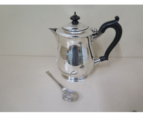 A silver presentation jug and a silver spoon, total weight 20.4 troy oz 