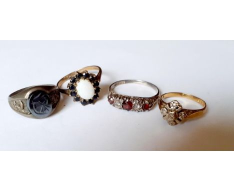 An 18ct illusion dress ring, 2.18g together with a silver dress ring with red and white cabochons, total weight 2g and a 9ct 