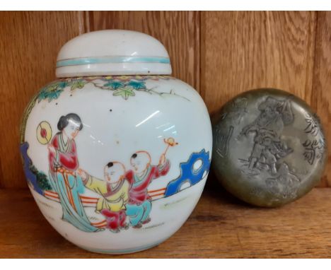 A Chinese jade trinket box with carved lid, interior and characters to the base together with a Chinese ginger jar with lidLo