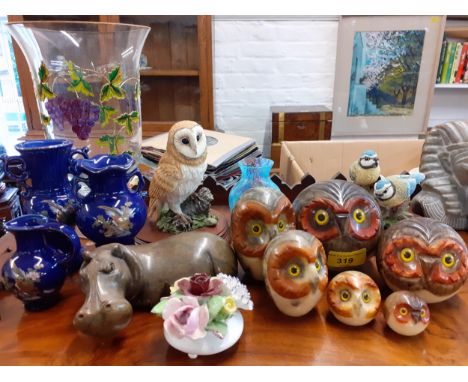 Household ornaments to include stone models of owls, a blue Isle of White glass vase, Leonardo Collection models and various 