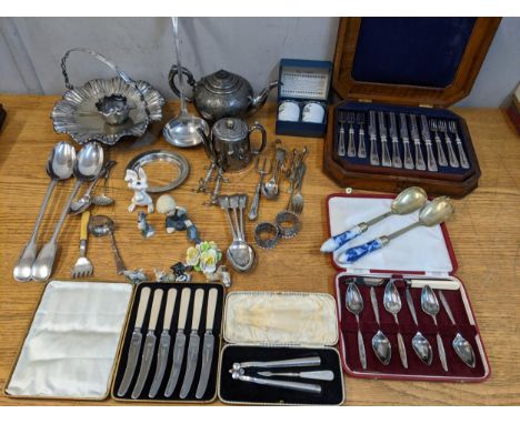 Silver plate and ceramics to include a fiddle and thread pattern basting spoons and ladle, a bread basket, flatware and other