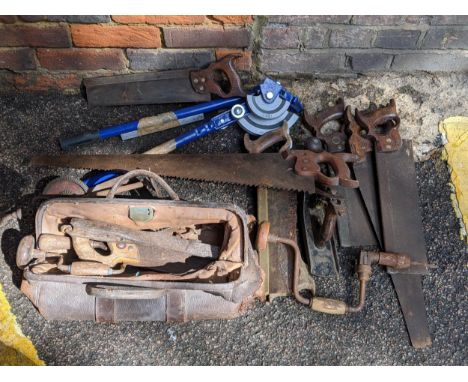 Mixed tools to include woodworking planes, saws, pipe bender and other itemsLocation: 