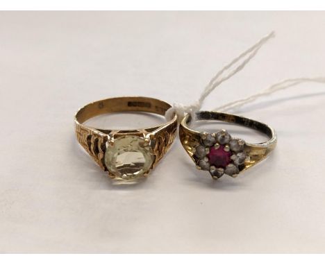 A 9ct gold and pale yellow stone dress ring, stamped 375, total weight 2.48g together with another dress ring having a centra