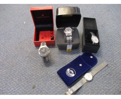 Three modern designer wristwatches to include a Charles Jourdan quartz watch in stainless steel case and integral strap, boxe