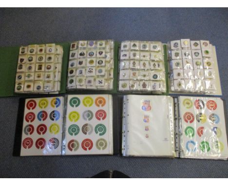 An extensive collection of enamel bowling badges circa 1970's to 1990's mounted in four albums from Amesbury to Weymouth Bowl