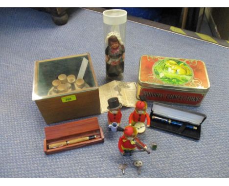 A mixed lot to include a Schuco clockwork violinist, drummer and beer drinking monkey, two with keys, a boxed Pen Ultimo foun