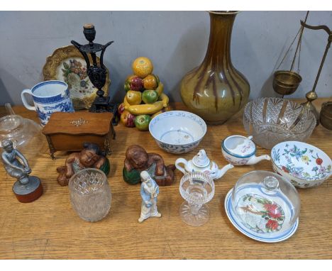 Mixed items to include a Pratware plate, a cast metal candlestick, a grey painted cast metal figure and other items, along wi