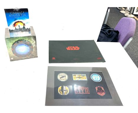 Selection of Star wars and Star gate items to include cloth badges and box sets