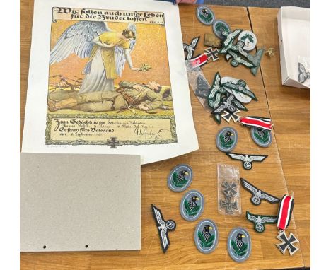 Reproduction WW1 and WW2 German Iron crosses and an Insignia and WW1 memorial scroll