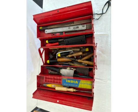 Metal tool box with a large selection of assorted tools
