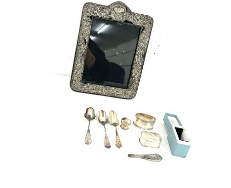 Selection of silver hallmarked items to include a photo frame, spoons napkin ring etc