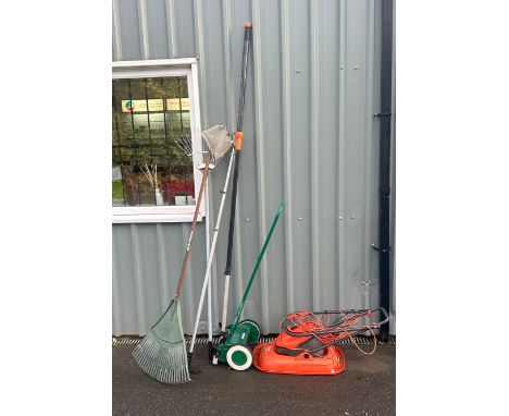 Selection of garden tools to include two rakes, extendable apple picker and an extendable pruner and a small hover mower and 