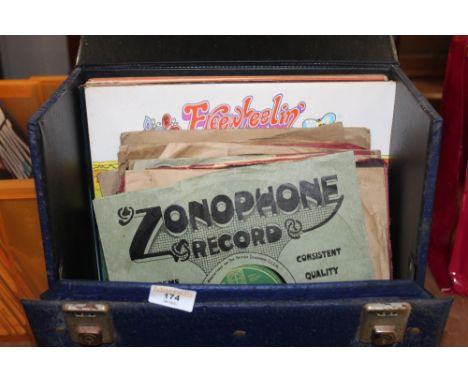 A vintage blue vinyl record case containing various classical records and some other miscellaneous records to include Free Wi